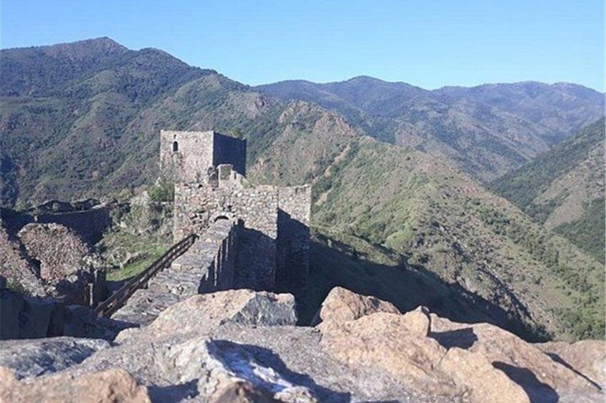 Ancient ruins on a mountain with a clear sky. 2