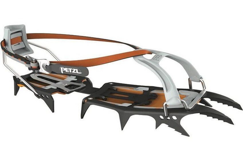 A climbing harness with metal clips and a brown leather strap. 4