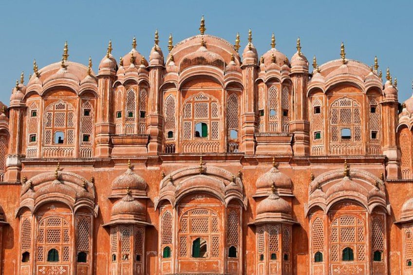 A large, ornate building with multiple domes and intricate architectural details. 1