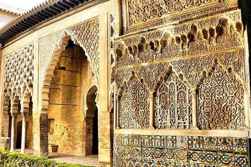 A historic building with intricate geometric patterns and arches. 3