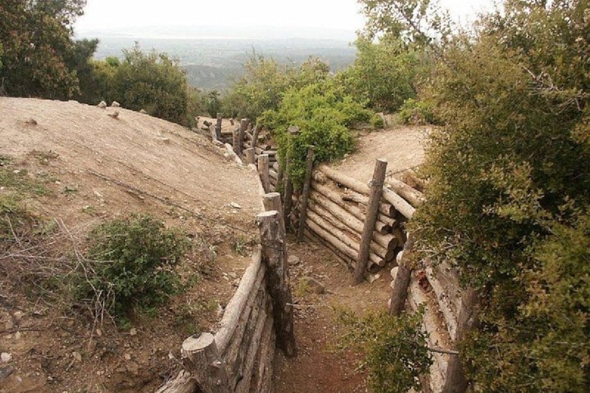 A dirt path with a wooden fence. 5