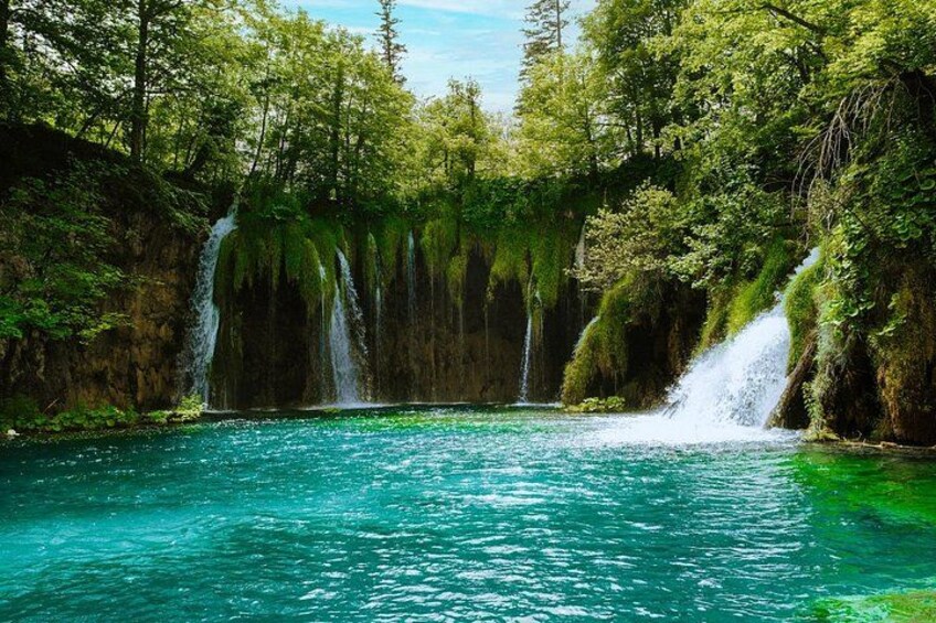 Breathtaking scenery at Plitvice Lakes National Park — crystal-clear lakes, forested hills, and peaceful waterfalls 4