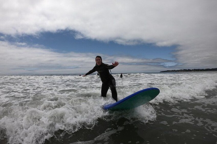 A person surfing in the ocean with waves. 2