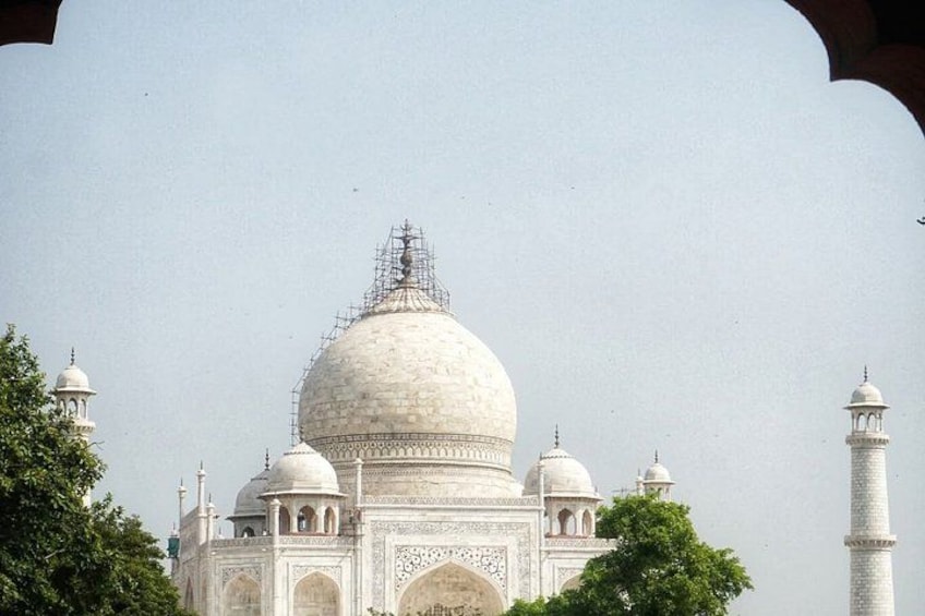 The Taj Mahal with its iconic dome and minarets. 4