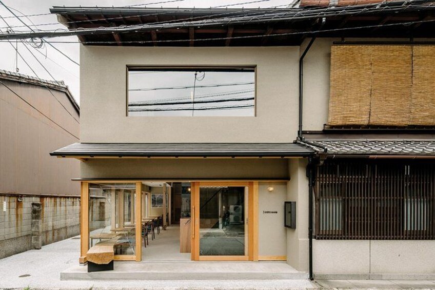 Welcome in! Bathed in daylight, our beautiful exterior invites you to step inside and begin an unforgettable experience. The open door awaits your arrival! 4