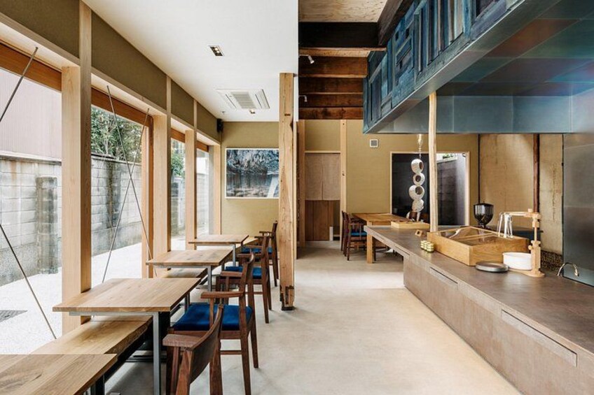 Step into a serene space designed for culinary creativity and peaceful relaxation, blending our main seating area, beautiful kitchen, and tranquil Japanese garden. 2