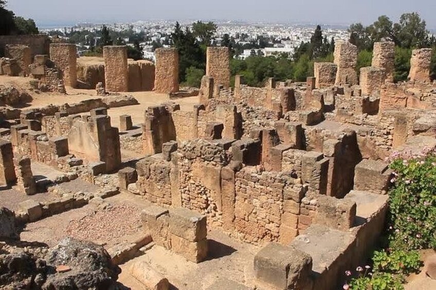 Ancient ruins with stone structures and walls. 5