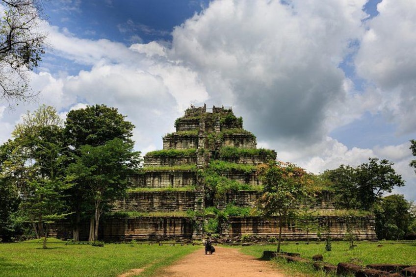 A large ancient temple complex with multiple tiers and a central staircase. 5