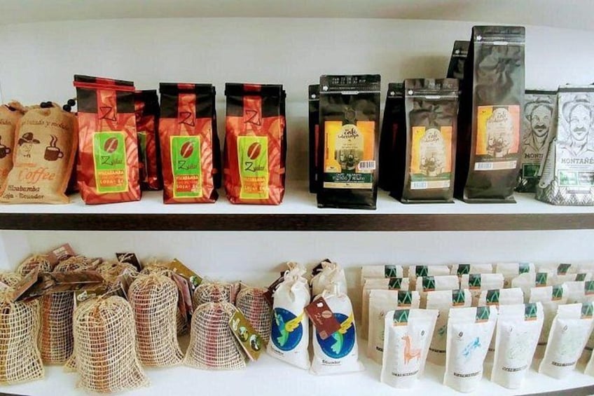 A variety of coffee products on display, including bags and packets. 5