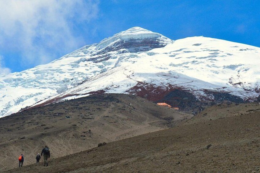 A snow-covered mountain with a clear sky. 3