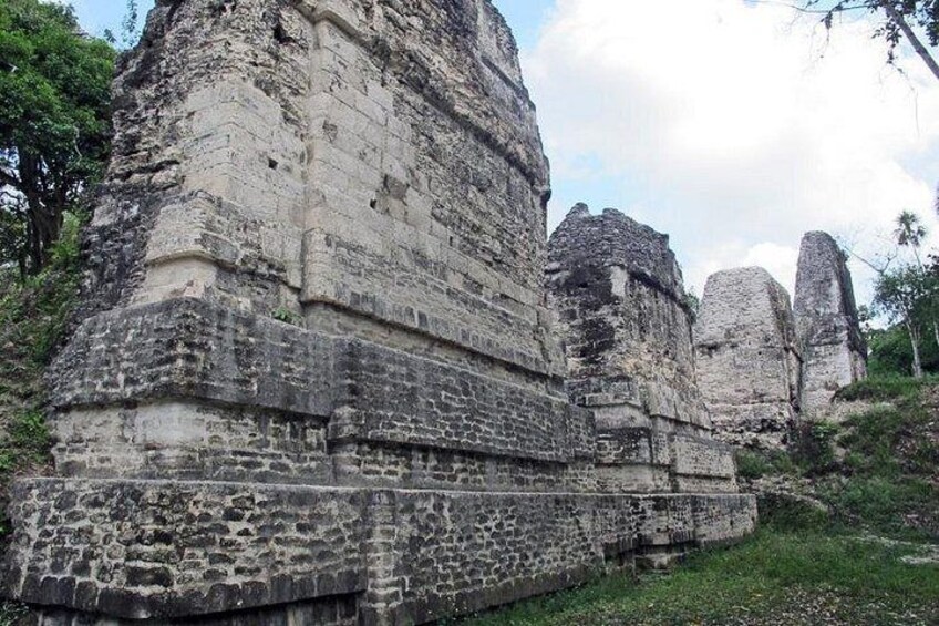 Ancient stone ruins with layered structures and a natural landscape. 2