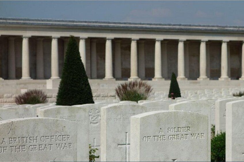A cemetery with headstones, one of which reads 'A BRITISH OFFICER OF THE GREAT WAR.' 4