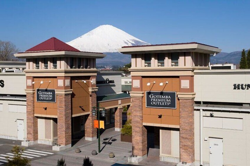 Gotemba Premium Outlet buildings with a snow-capped mountain in the background. 3