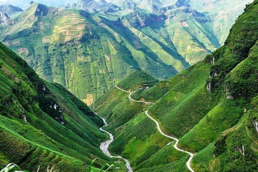 A winding road through terraced hills. 2