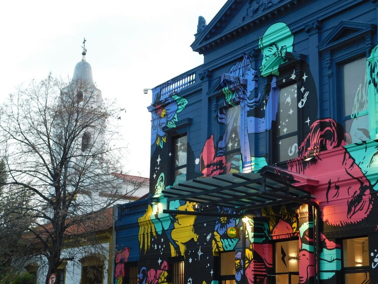 A building with colorful graffiti art. 3