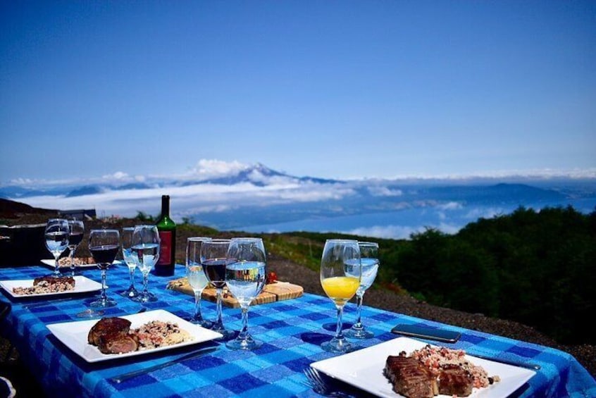 Lunch on the clouds - Exploration Full Day Premium Premium Osorno Volcano and Petrohué Falls