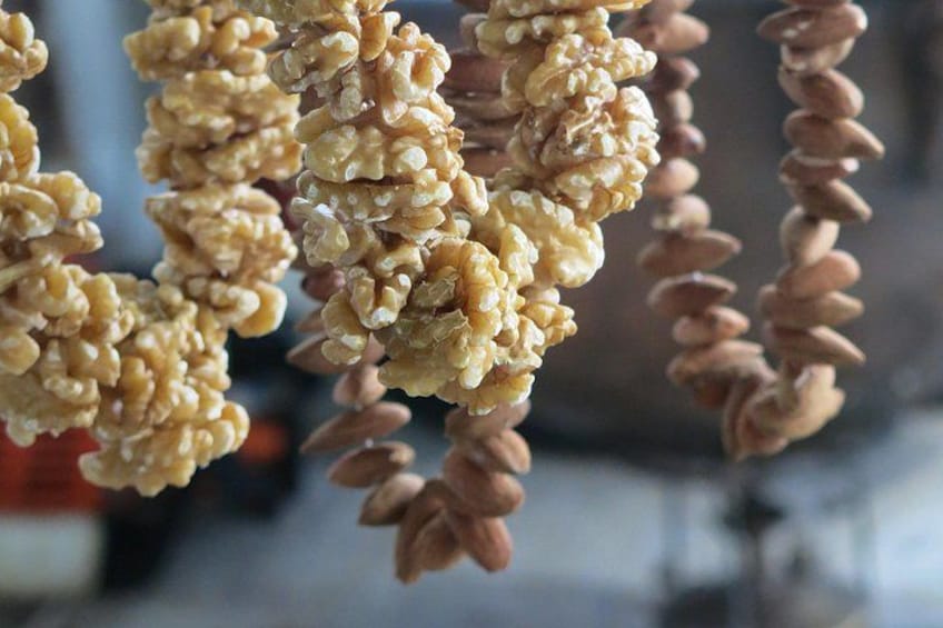 A close-up of a cluster of walnuts. 4