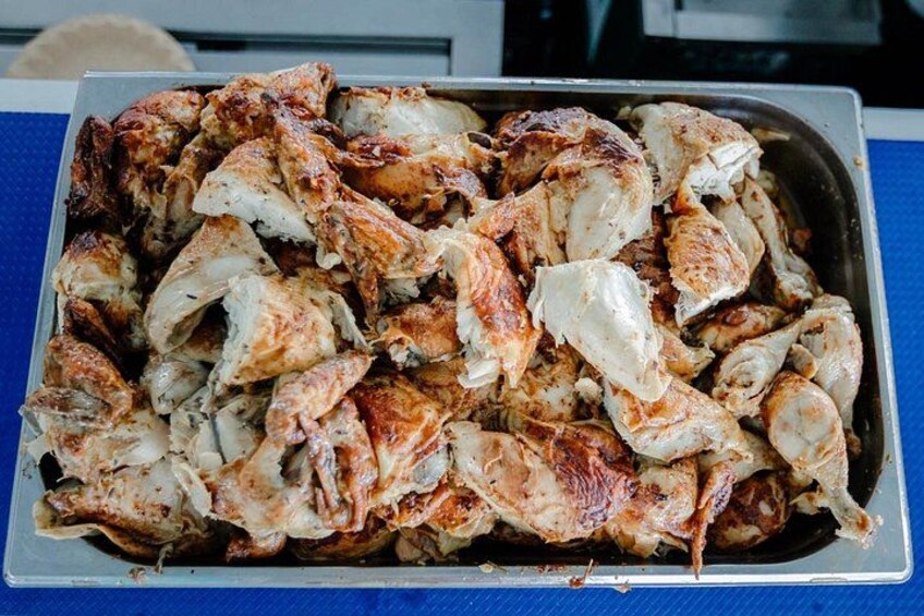 A tray of cooked chicken wings. 5