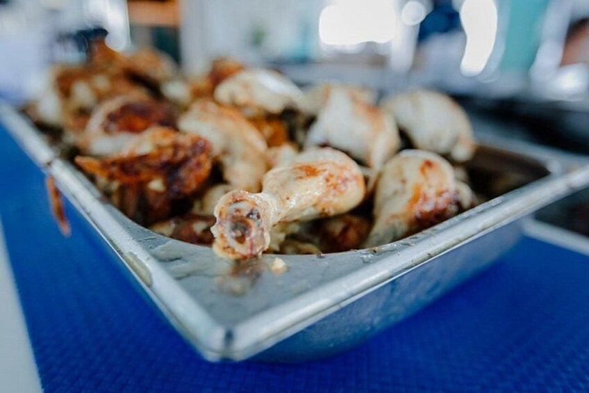 A tray of cooked chicken wings. 4