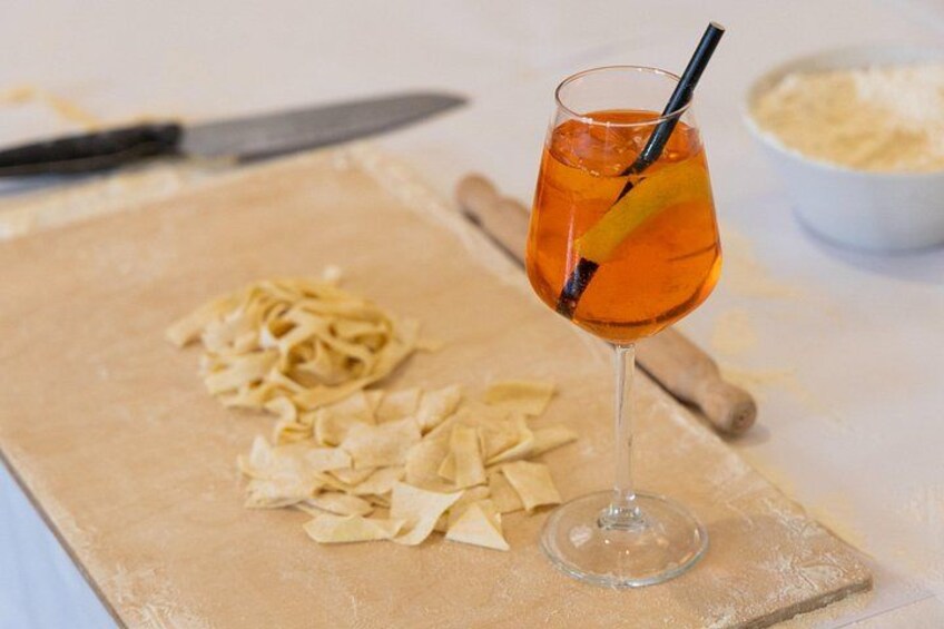 Freshly made pasta with a refreshing Spritz on the side. 3