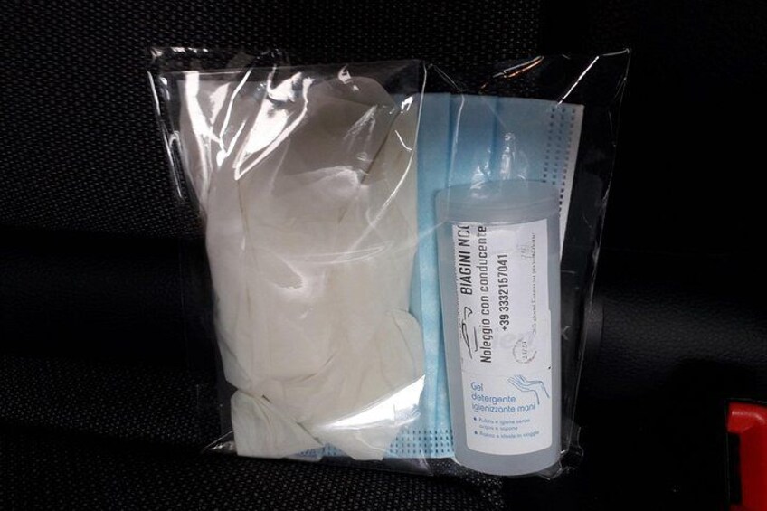 A plastic bag containing a white object and a bottle with a label. 2
