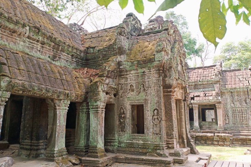 An ancient temple with intricate carvings and columns. 4