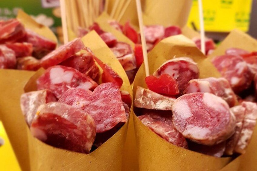 There are many varieties of salami to taste and shop for. 2