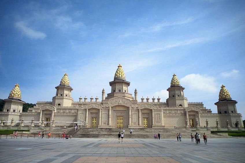 A large, ornate building with multiple domes and a grand entrance. 2