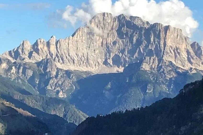 A mountain range with rugged peaks and a valley. 5