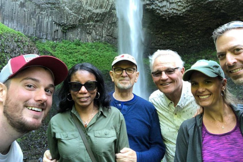 Happy customers in front of waterfalls in Columbia River Gorge 2