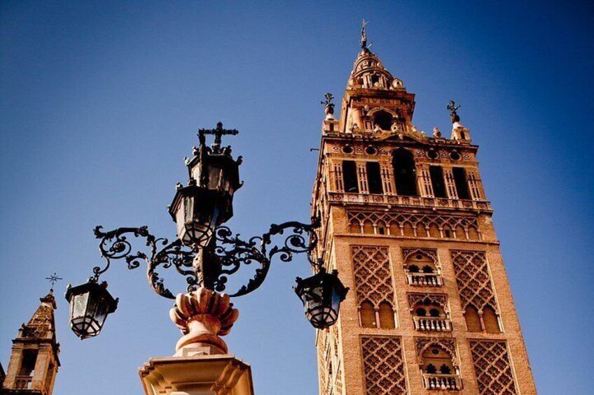A historic tower with intricate architecture and a prominent clock. 3