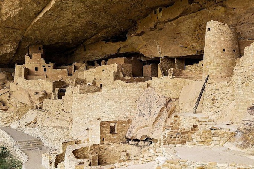 Ancient cliff dwellings with multiple kivas and structures. 3
