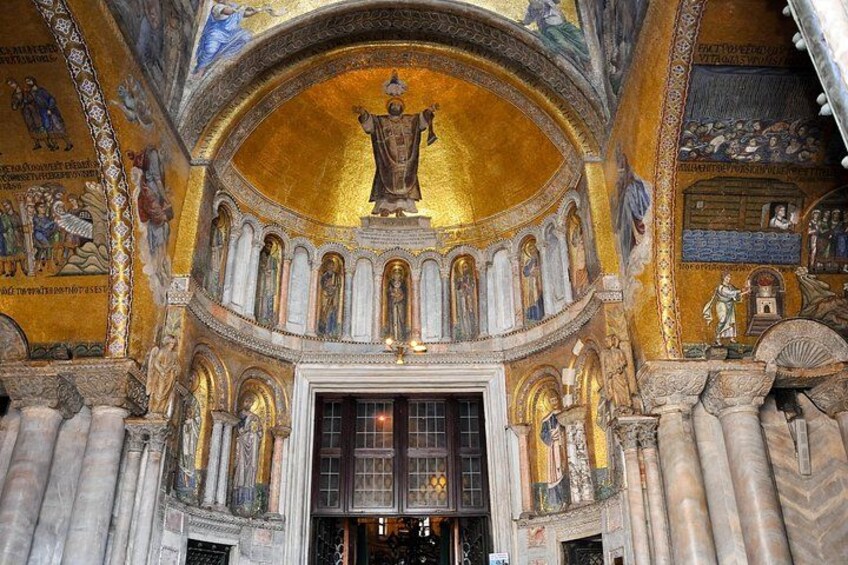 A grand interior with a golden dome, intricate mosaics, and classical architecture. 5