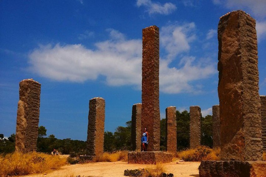 Ancient stone ruins with tall, rectangular pillars. 3
