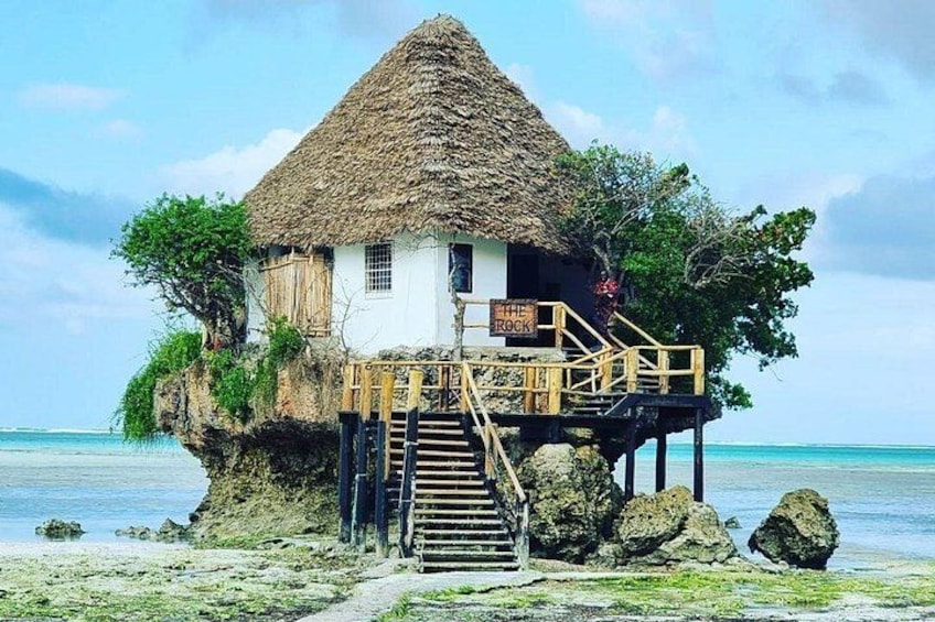 Private Dolphin Tour; Kuza Cave; Paje Beach; The Rock Restaurant; Jozani Forest 4