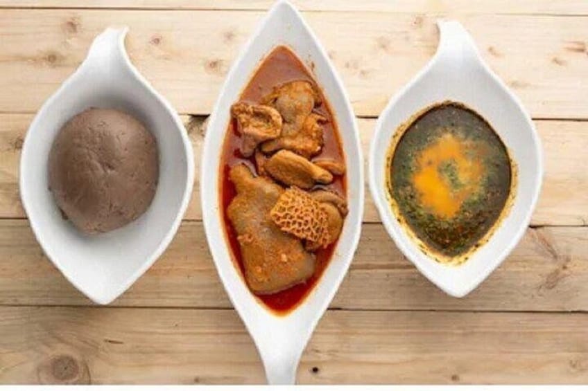 Three white dishes on a wooden surface. 1