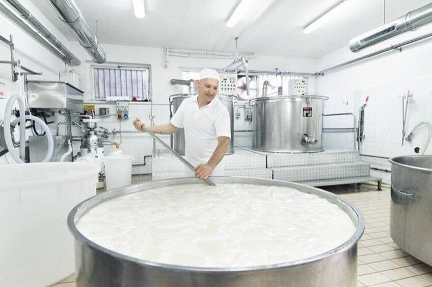 Visit an authentic Italian cheese maker dairy. 1