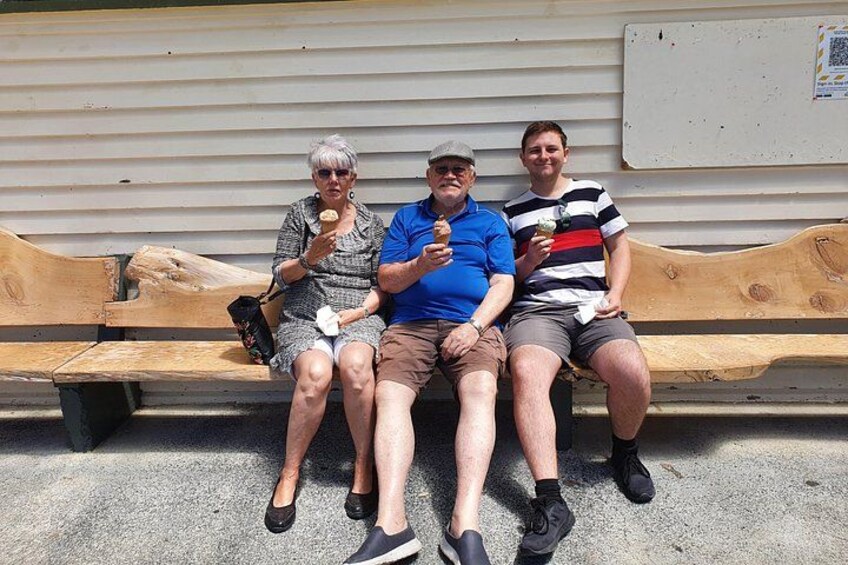 Happy customers enjoying an ice cream at Te Kao store. 2