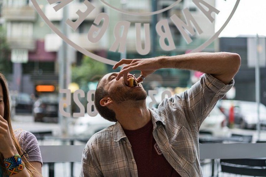 A person drinking from a bottle. 3