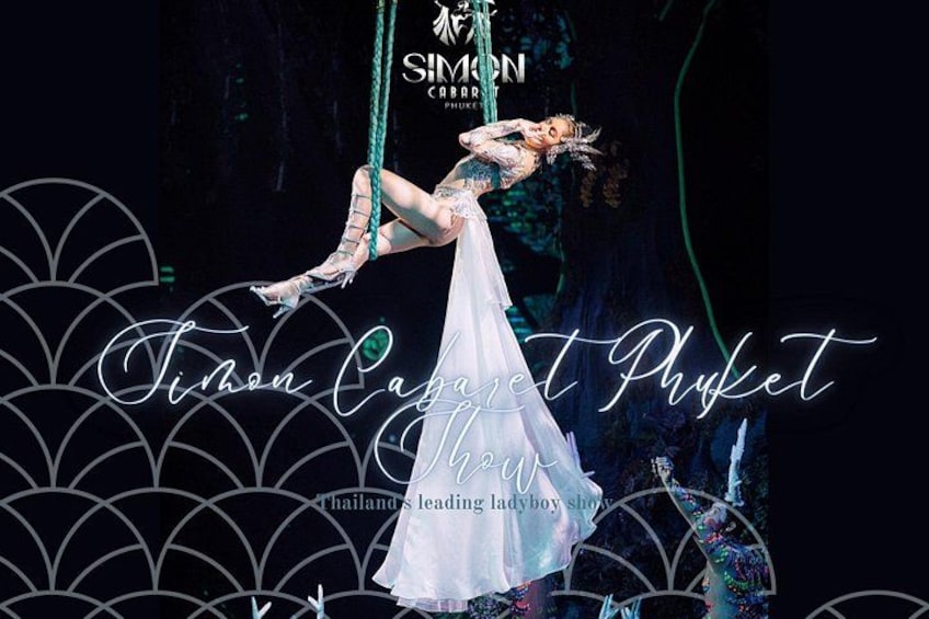 A performer in a white dress suspended in mid-air, with a dark background and abstract patterns. 4