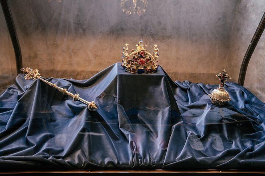A display of religious artifacts on a dark cloth. 2