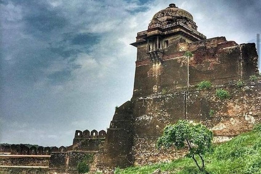 A historic fort with a large dome and arched windows. 2