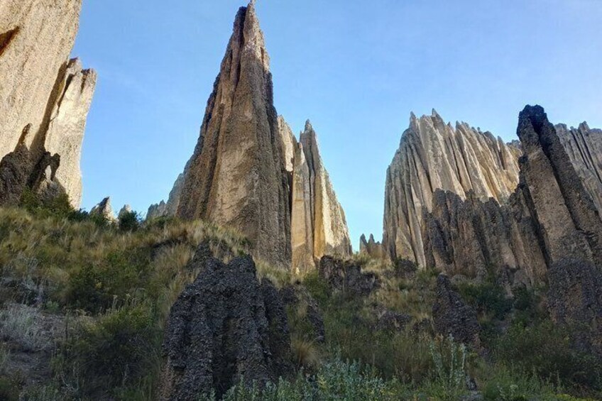 A rocky landscape with prominent vertical rock formations. 5