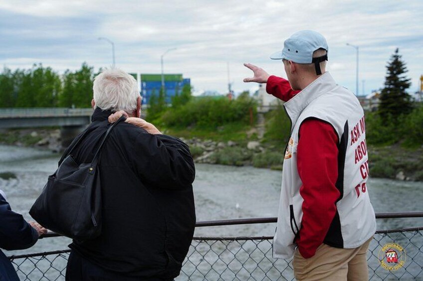 Driver Issac showing guest the view from the ship creek bridge 2