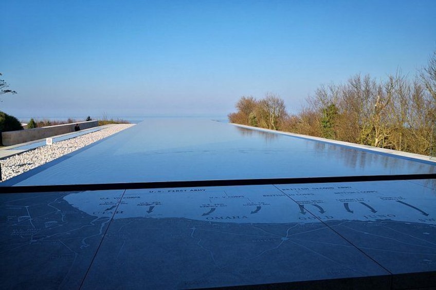 A road with a map overlay and a clear sky. 5