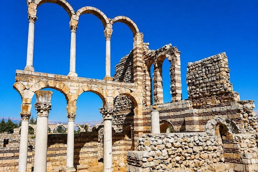 Ancient ruins with arches and columns. 2