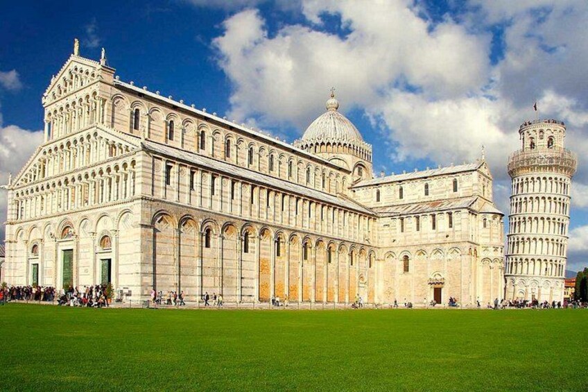 A large historic building with a prominent tower and a dome. 3