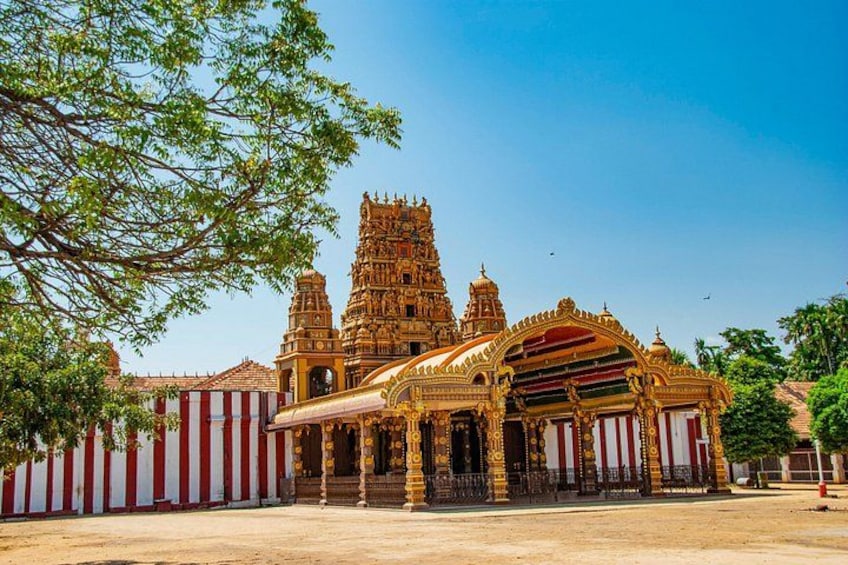 A temple with intricate carvings and a large central tower. 5