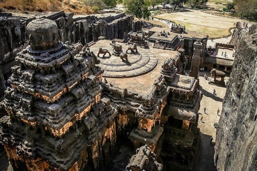 An ancient temple complex with intricate architecture and a large open courtyard. 4