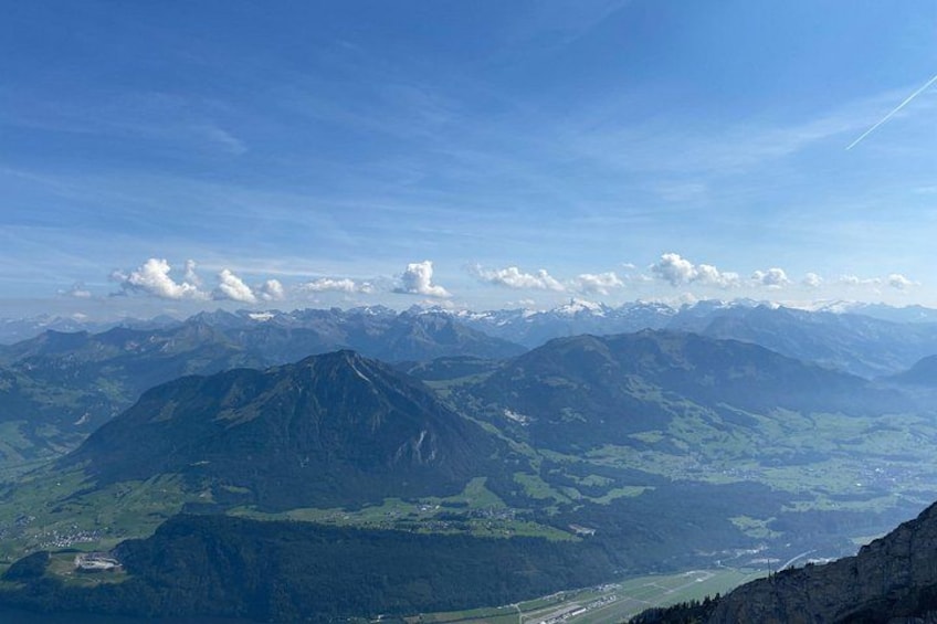 A mountain range with a valley below. 3
